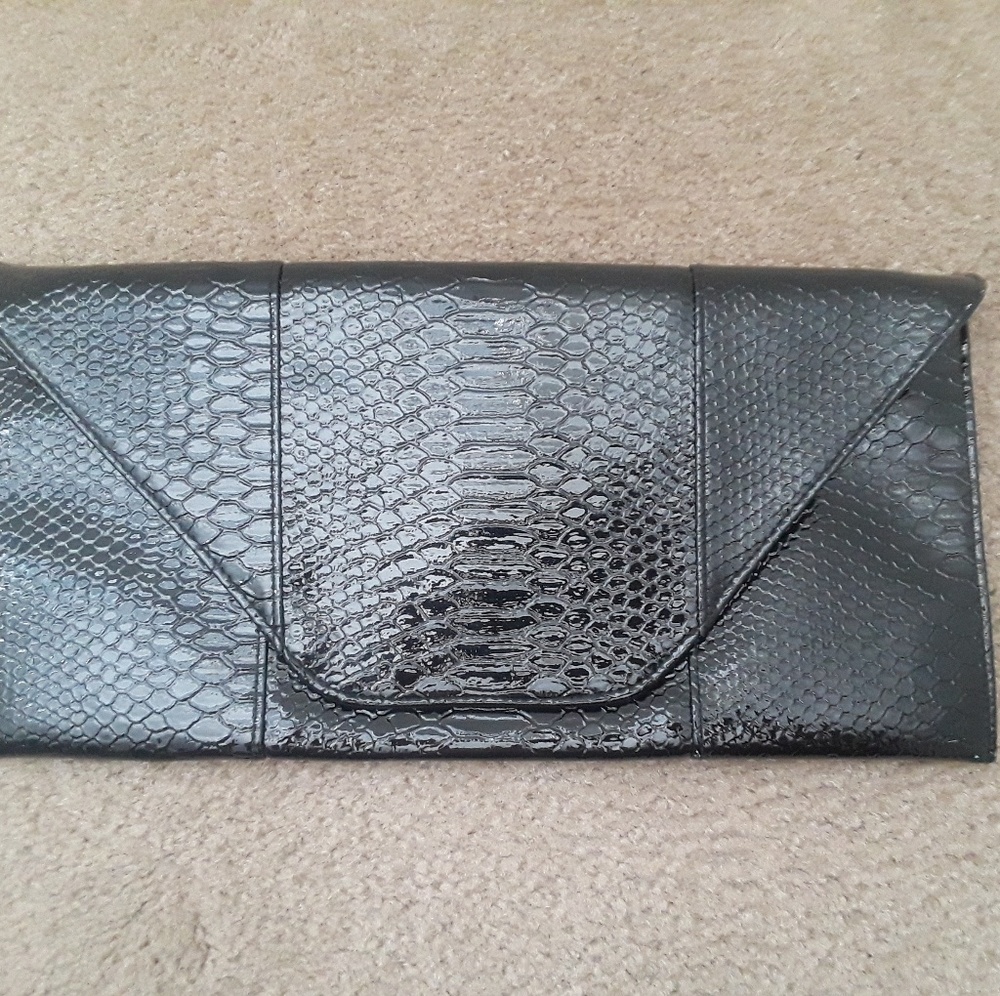Black faux snakeskin clutch